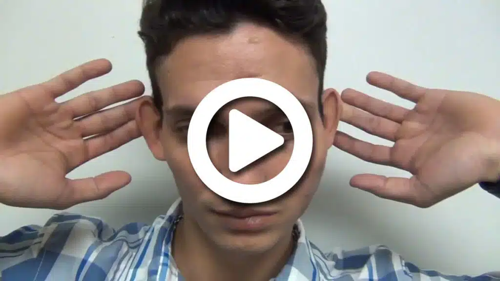 video of a young man flexing his new magnetic implant-retained ear prosthesis to demonstrate its very secure attachment