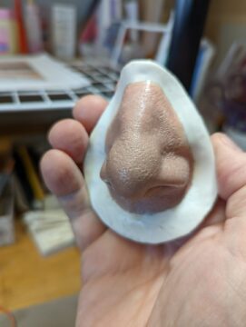 finely sculpted wax prototype for nasal prosthesis