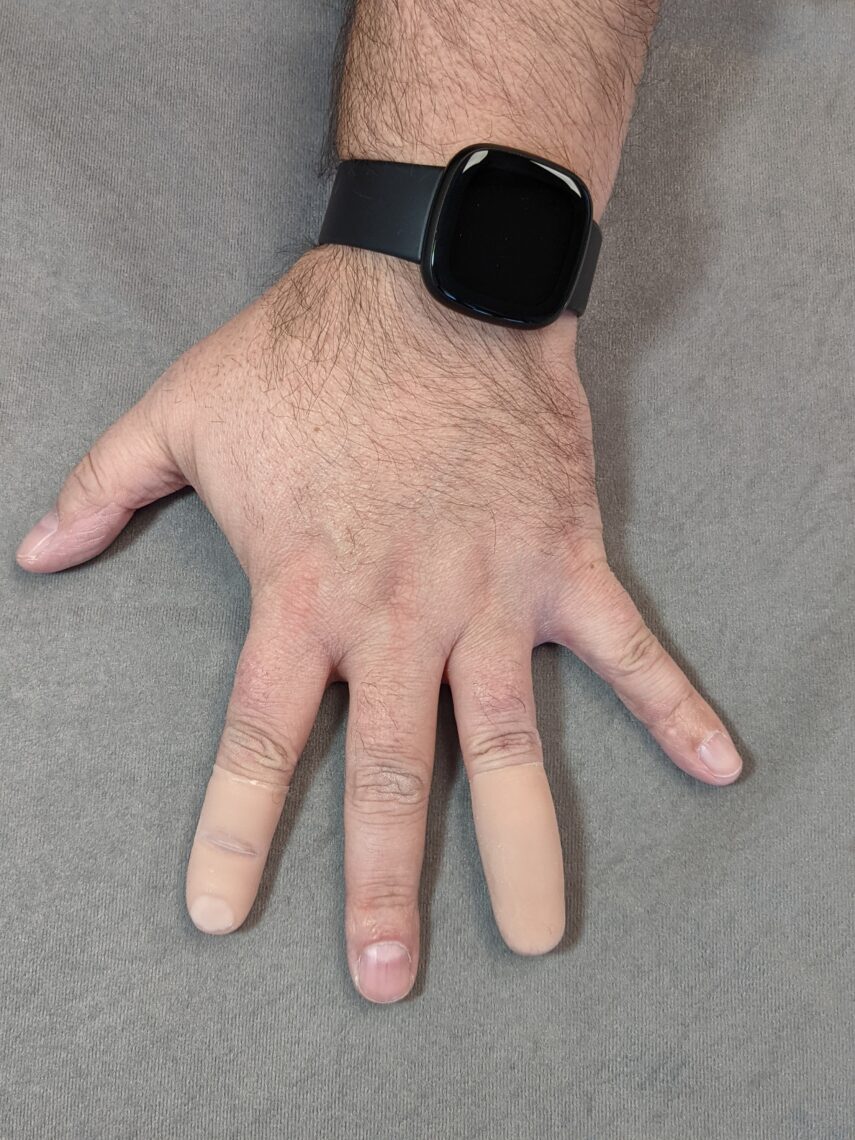 picture of silicone fingers on guitar player