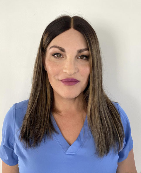 anaplastologist Maddie Singer in scrubs