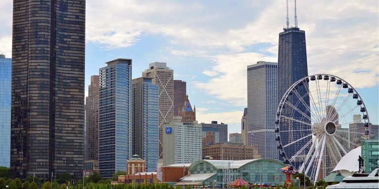 a city skyline with tall buildings