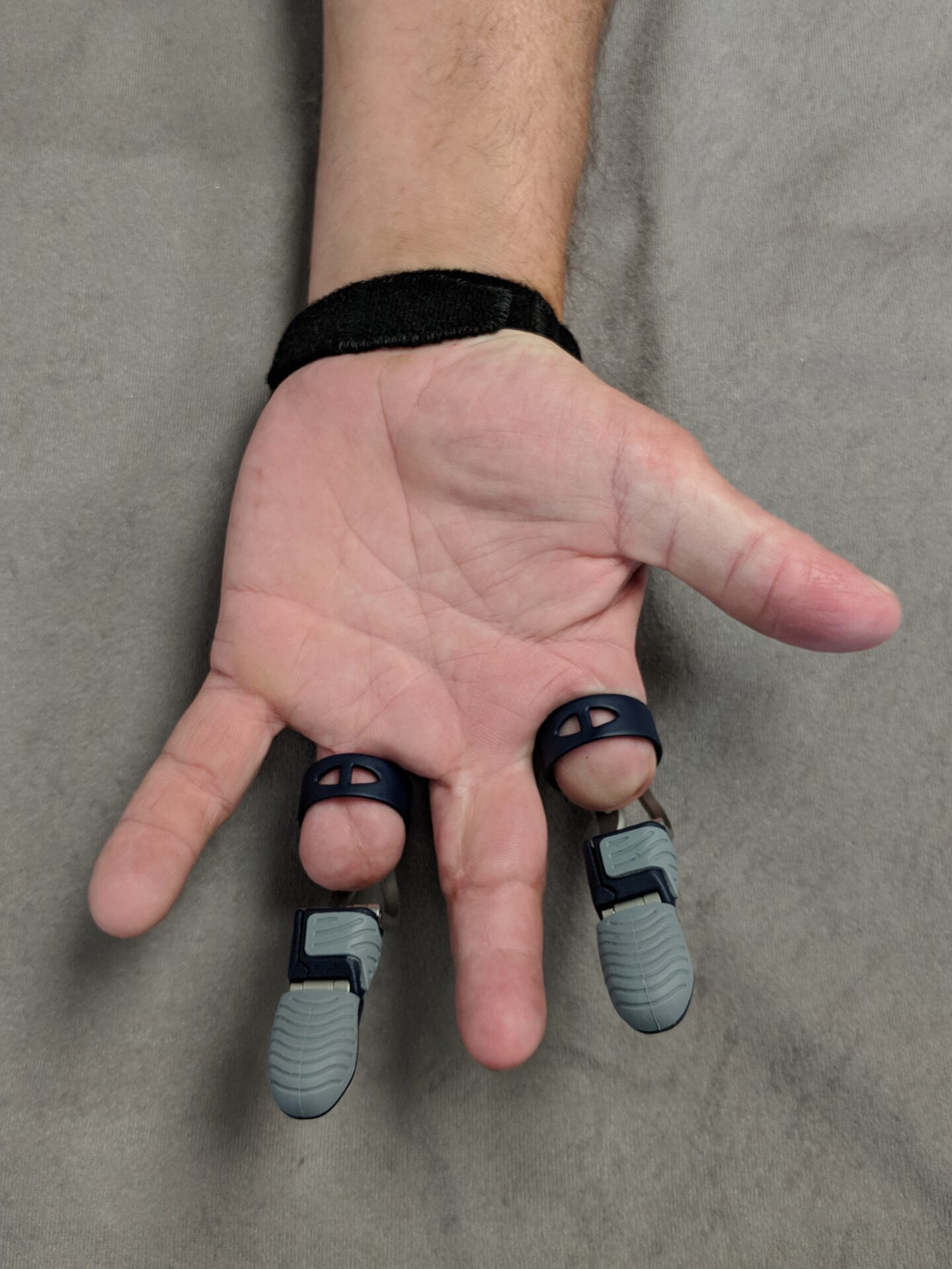 man's hand with articulating index and ring fingers