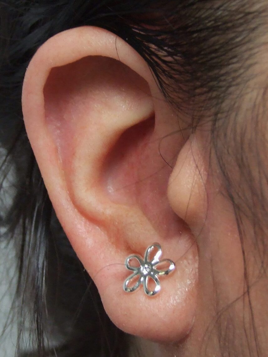 prosthetic ear with earring