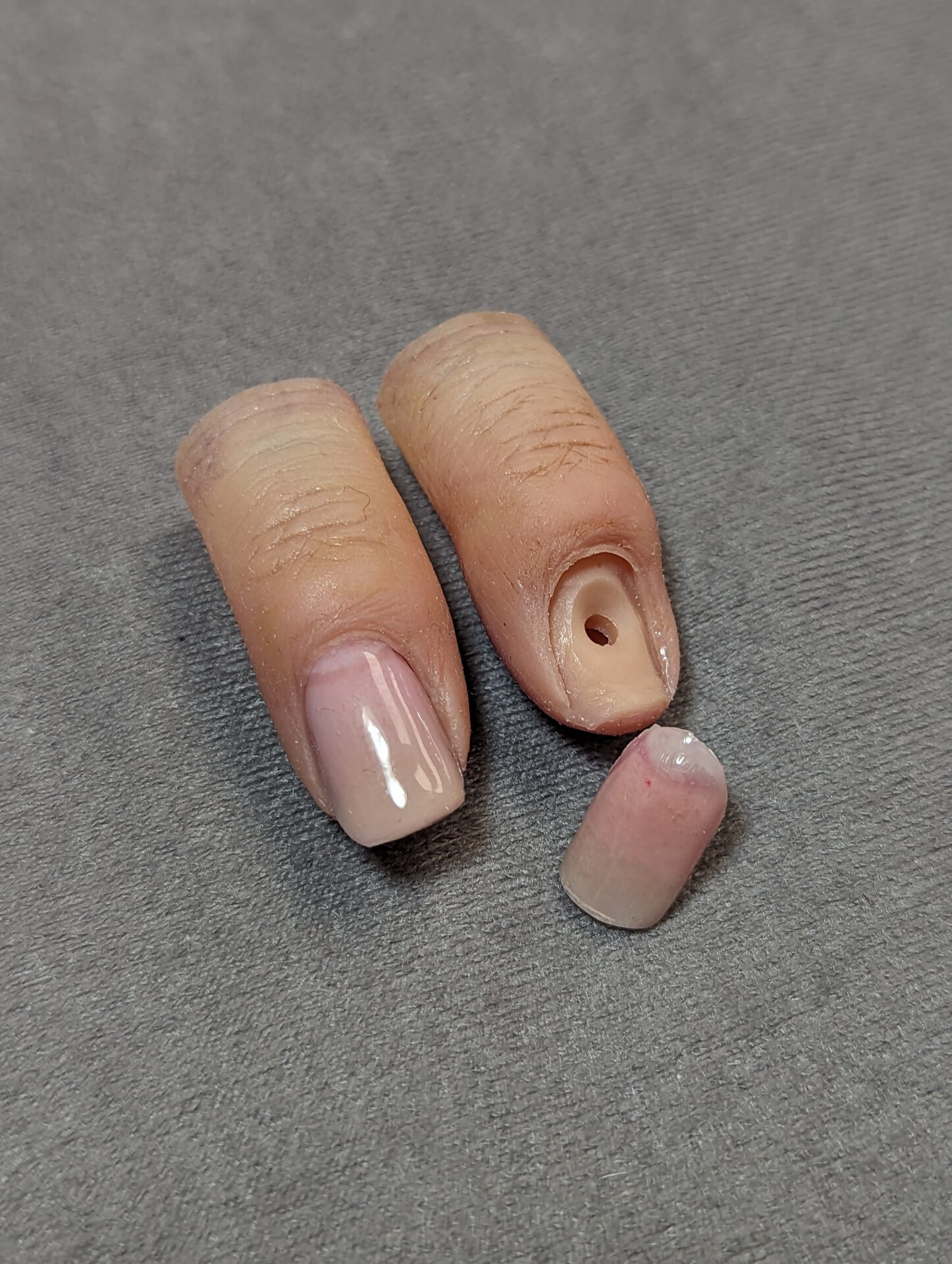 very lifelike prosthetic fingertips with nails