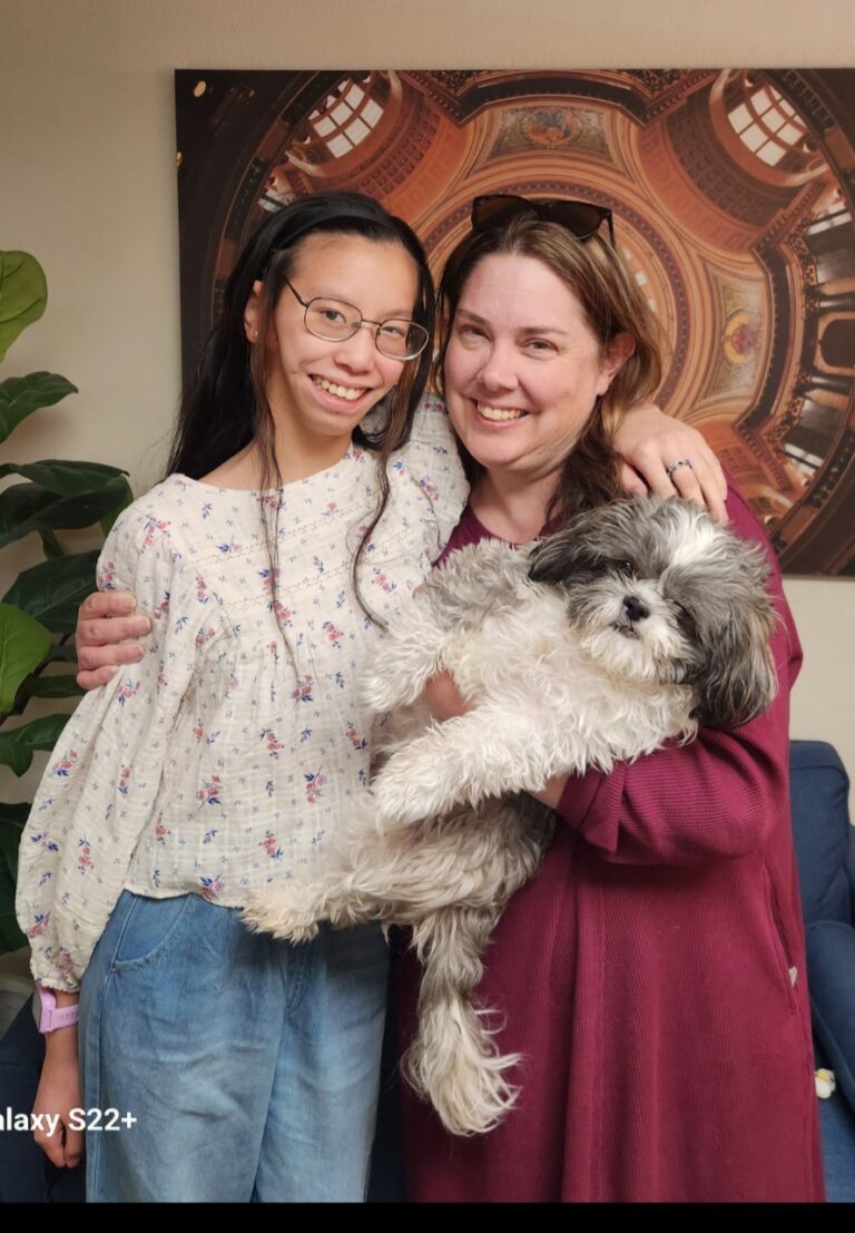 photo of Goldenhar patient and mom with new ear prosthesis