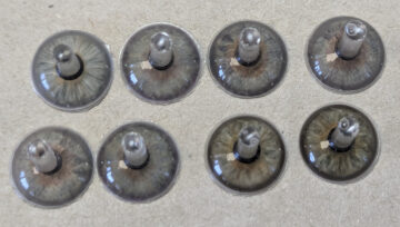 Picture of custom iris buttons for prosthetic eyes